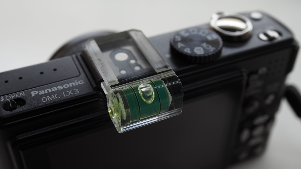 Spirit level mounted on a camera showing how angular measurement works