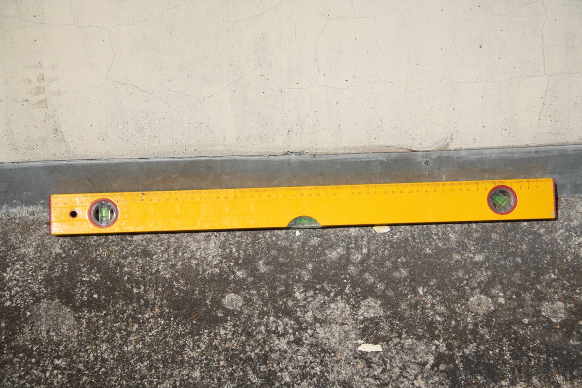 Spirit level showing multiple bubble vials for checking both horizontal and vertical axes