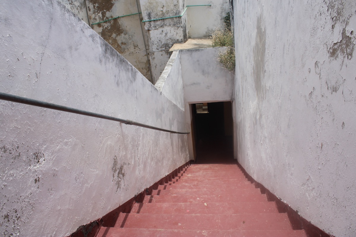 An exterior staircase connecting ground level to an upper floor