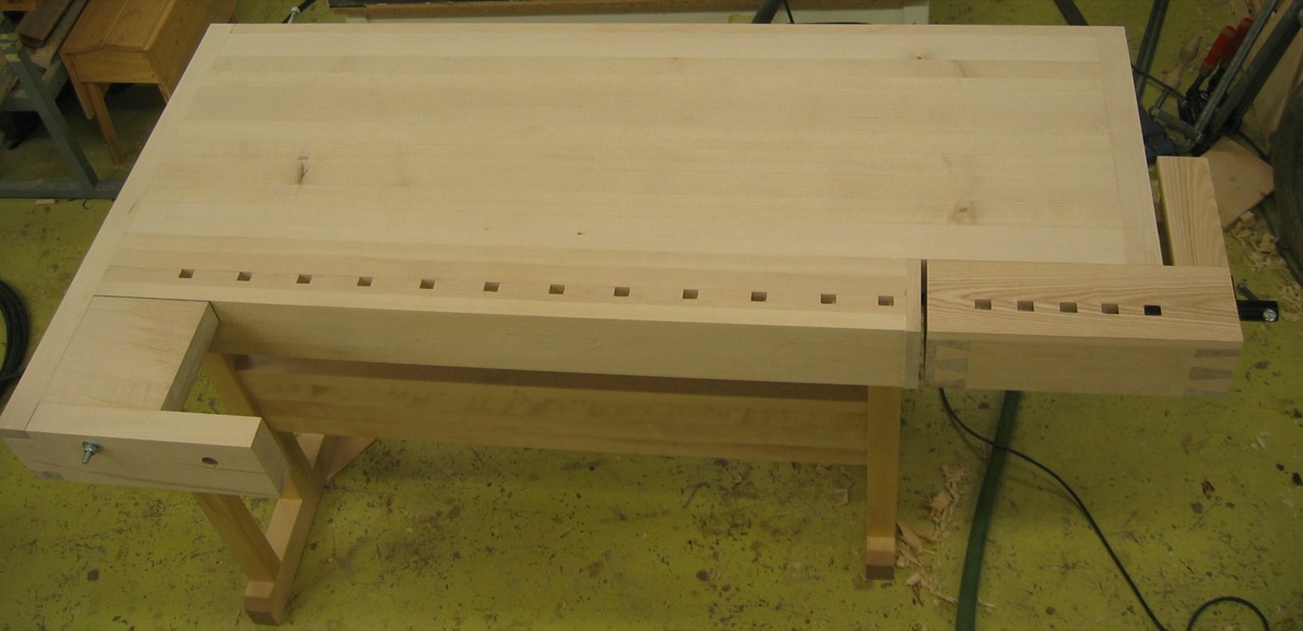A carpenter's solid hardwood workbench with vise for stable precision measurement