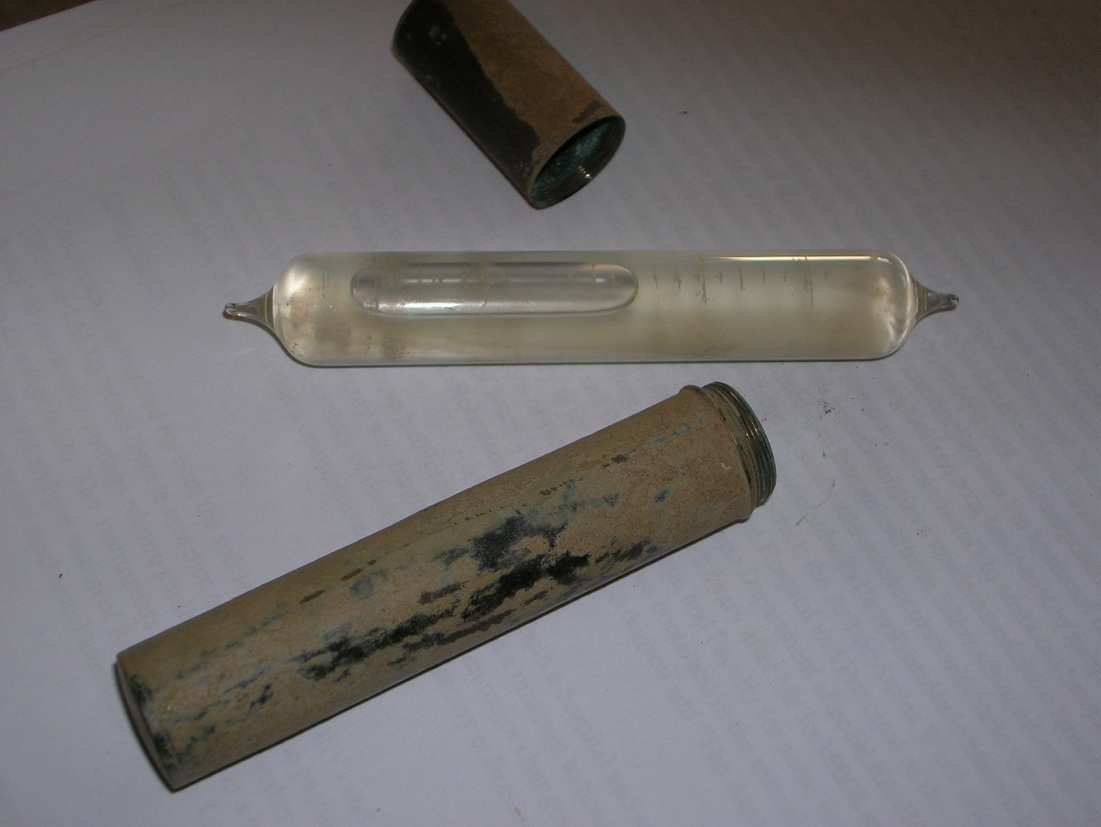 A spirit level tool used to check a surface showing how to verify readings